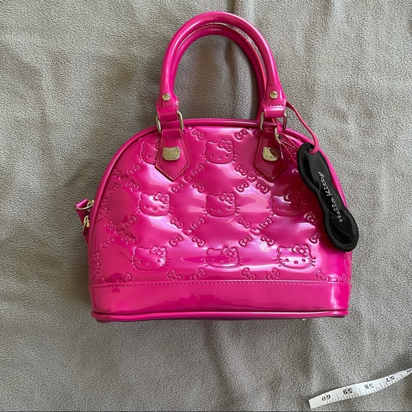 Hello Kitty Handbags - Loungefly hello kitty pink embossed purse
